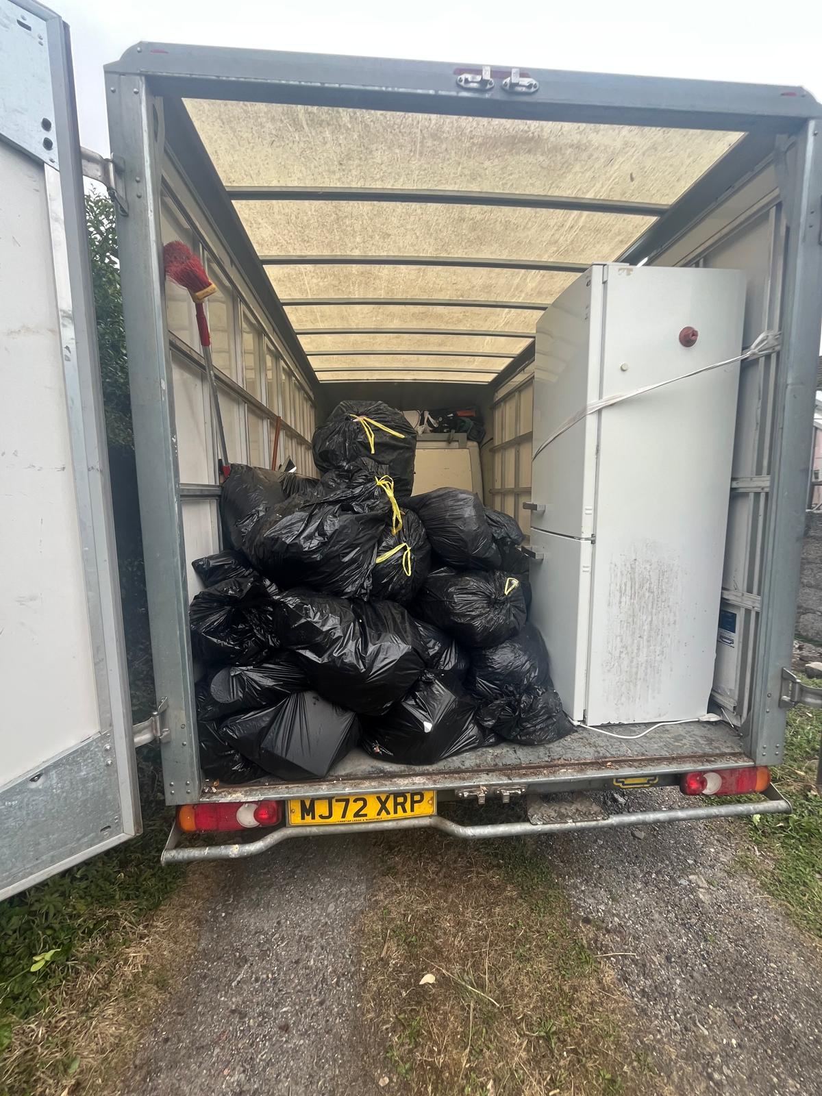 Lanora House van loaded with black bin bags after a collection in Cornwall